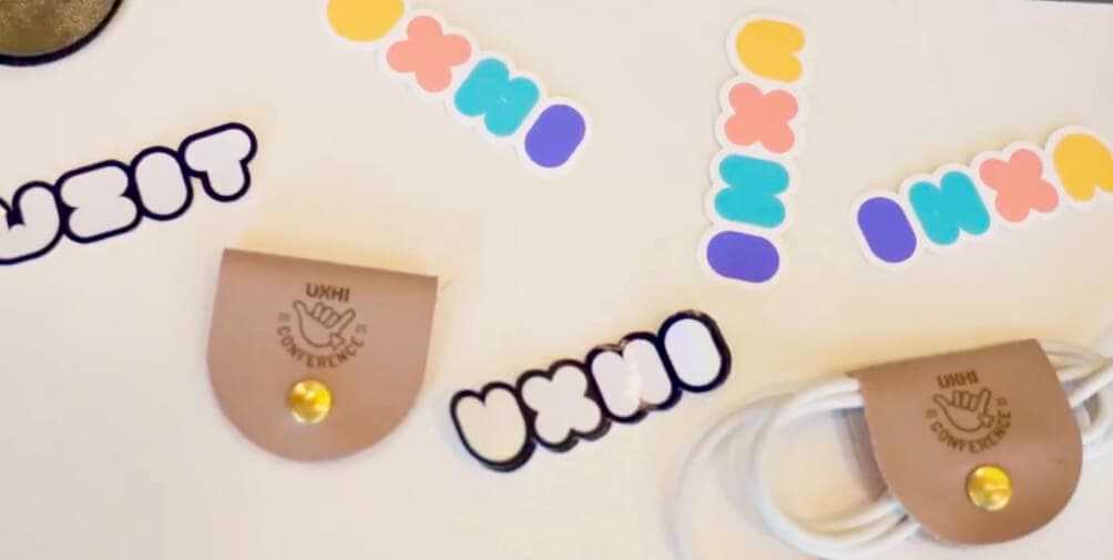 UXHI conference stickers and swag