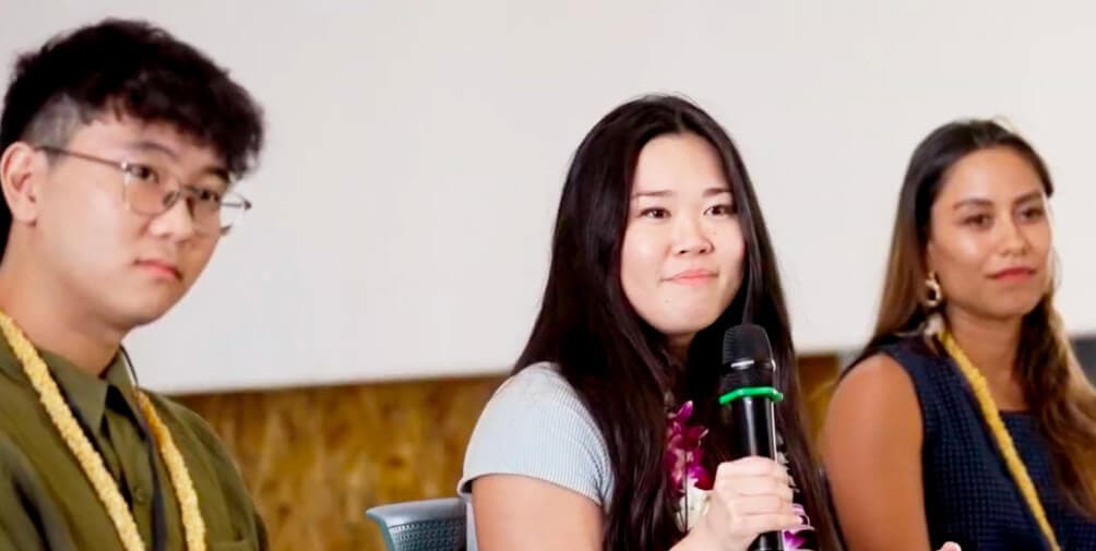 UXHI panelists speaking at conference